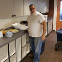 John E. setting up the dinner buffet